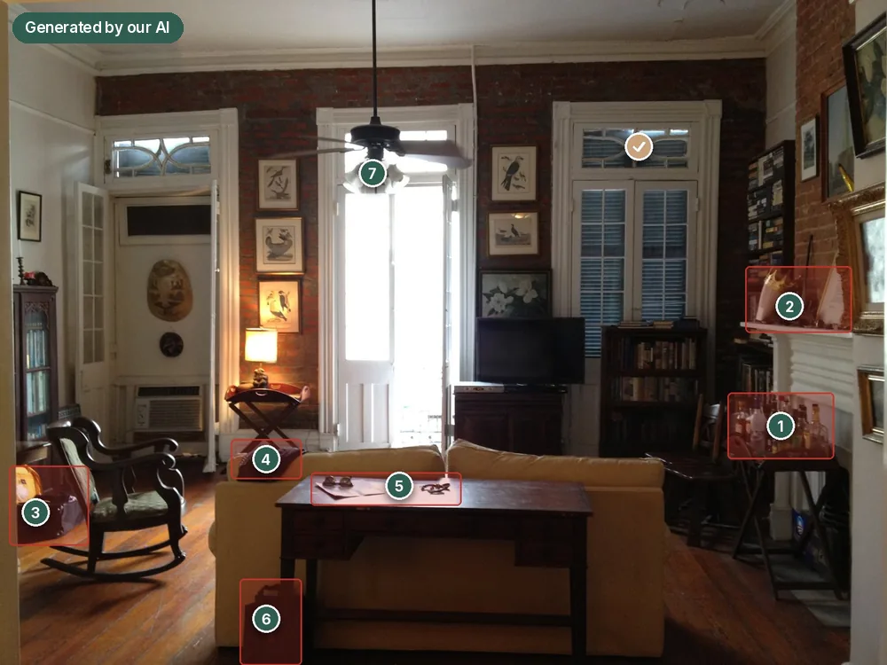 A real living-room photo annotated by Stagenote with numbered pins and red zones to clear